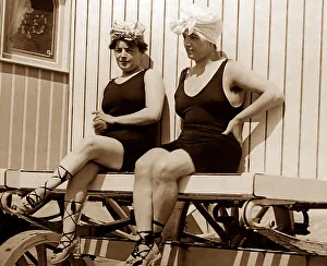 Girls relaxing on a bathing machine, early 1900s