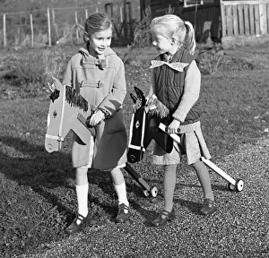 Hobby Prints: Two girls riding their hobby horses