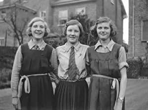 Teenage Collection: Three girls in school uniform in a garden