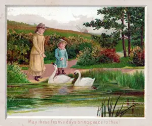 Two girls and two swans on a Christmas card