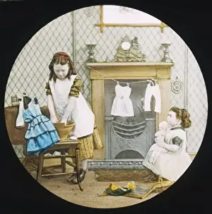 Girls Wash Dolls Clothes