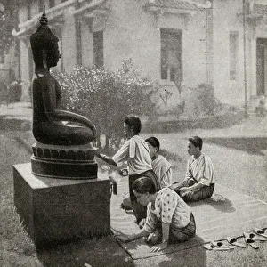 Images Dated 4th September 2018: Giving flower offerings to Buddha, French Indochina