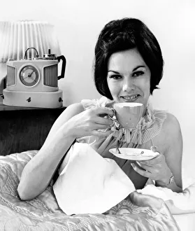 Nightie Gallery: A glamorous female model with her trusty Goblin Teasmade