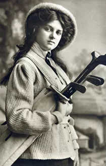 Irons Gallery: A Glamorous Young Lady Golfer. Date: circa 1909