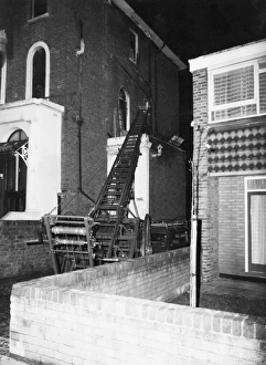 Images Dated 31st May 1977: GLC-LFB 50 foot wheeled escape ladder in use