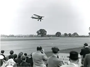 Gladiator Prints: Gloster Gladiator, G-AMRK, gives a low flypast at the 19?