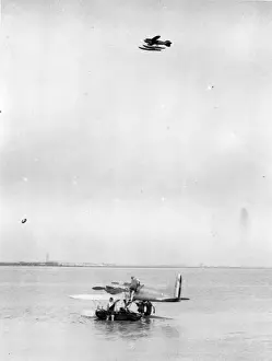 A Gloster IV flies over a Supermarine S5 in Venice in 1927