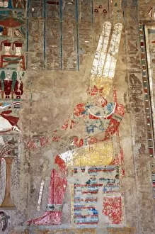 Amun Gallery: The god Amon, sitting at a table of offerings. Temple of Hat