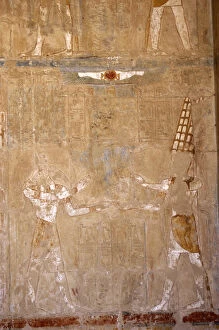 Anubis Gallery: God Anubis (jackal-face) and god Amon (feather headdress). T