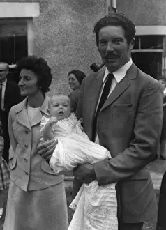 Godfather Prints: Godfather holding baby at a christening