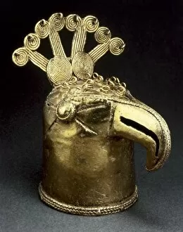 Gold stick handle with figure of a bird. Majagual