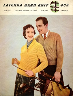 Images Dated 7th September 2017: Golfing couple in knitted jumpers