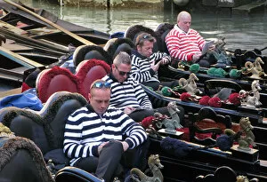 Relax Gallery: Four gondoliers in their gondolas behind St Marks, Venice
