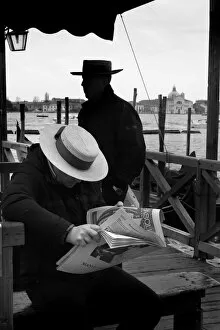 Degli Collection: Two gondoliers wait for tourist clients at St Marks, Venice