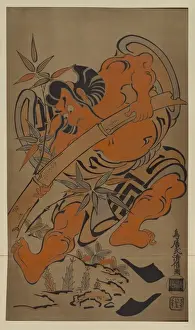Goro pulling up bamboo