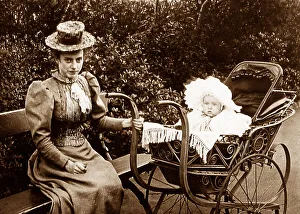 Pram Prints: Governess or nanny with baby in pram Victorian period