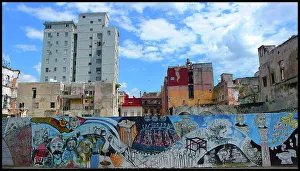 Graffiti and apartment buildings, Havana, Cuba