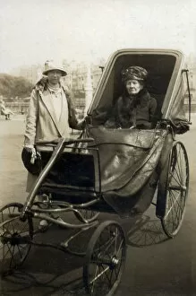 Spin Gallery: A very grand-looking (and wealthy) elderly lady going out for a spin in her bath chair