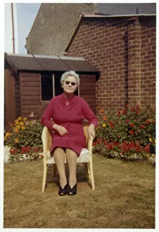 Images Dated 4th February 2021: Grandmother photographed in a suburban back garden