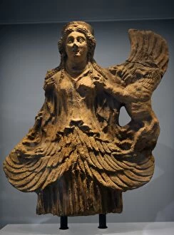 Terracotta Collection: Greek Art. Archaic Period. Winged goddes who tamed wild anim