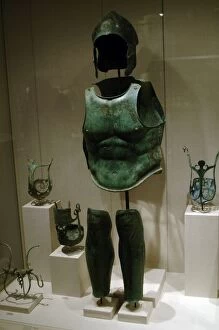 Images Dated 31st May 2008: Greek art. Magna Graecia. Bronze helmet, cuirass and shin gu