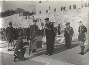 Greek boy scouts and leaders in outdoor ceremony