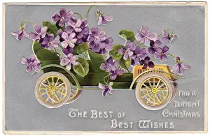 Green car full of flowers on a Christmas postcard