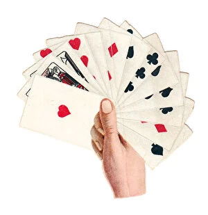 Images Dated 23rd October 2015: Greetings card in the shape of a hand holding playing cards