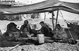 Group of Bedouins in their tent, Holy Land