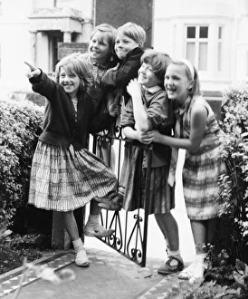Group of children at a gate, Balham, SW London Group of children at a gate, Balham, SW London