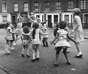 Group of children playing on a Balham street, SW London