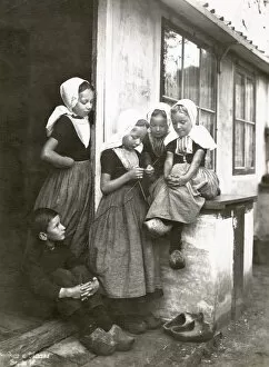 Clogs Gallery: A group of Dutch fisherchildren, four girls and a boy, wearing traditional costumes