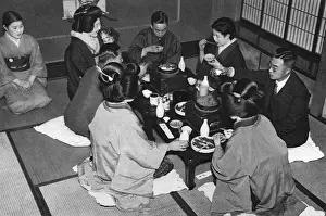 Enjoy Prints: A group of Japanese people eating a meal