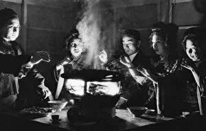 Charcoal Gallery: A group of Japanese people enjoying a meal