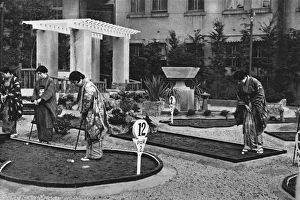 Images Dated 21st June 2017: A group of Japanese women play miniature golf