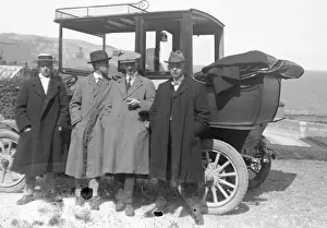 Whit Prints: Group of men by a car