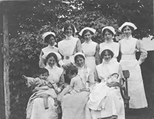 New Images July 2020 Prints: Group of nurses and children outdoors