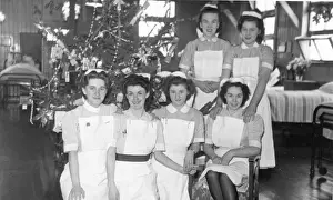 Britain British Nurse Nurses Medicine Prints: Group of nurses and Christmas tree