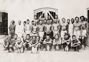 Group of prisoners in shackles, irons, India