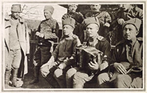 Accompanied Gallery: A group of Russian soldiers in camp accompanied by their musical instruments