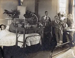 A group of Tommies and two nurses relaxing in the garden