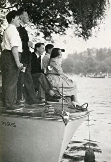 Adams Gallery: Group watching the Henley Regatta from boat, July 1958