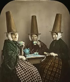 Drink Gallery: Group of three Welsh women in traditional costume