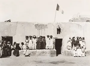 Ouled Prints: Group of women, Ouled Nail Algeria, French flag flying