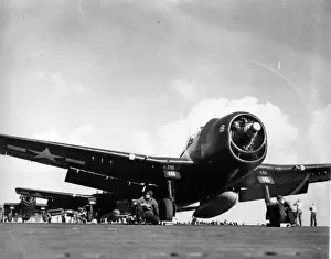 Grumman Prints: Grumman F6F-5 Hellcat -ready to launch from the deck of