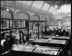 Guide Lecturer with visitors, c. 1920