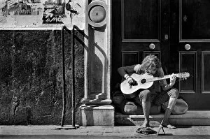 Cadiz Gallery: Guitarist on doorstep, Cadiz