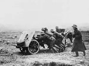 Howitzers Prints: Gunners transporting weapon WWI