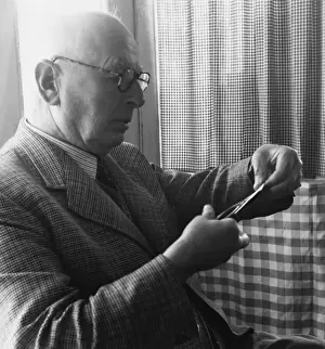 H. L. Oakley cutting a silhouette