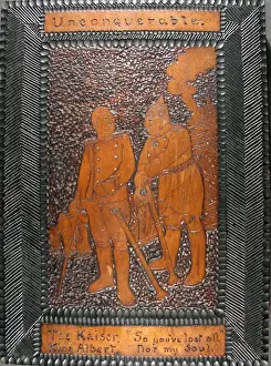 Hand carved oak plaque entitled Unconquerable